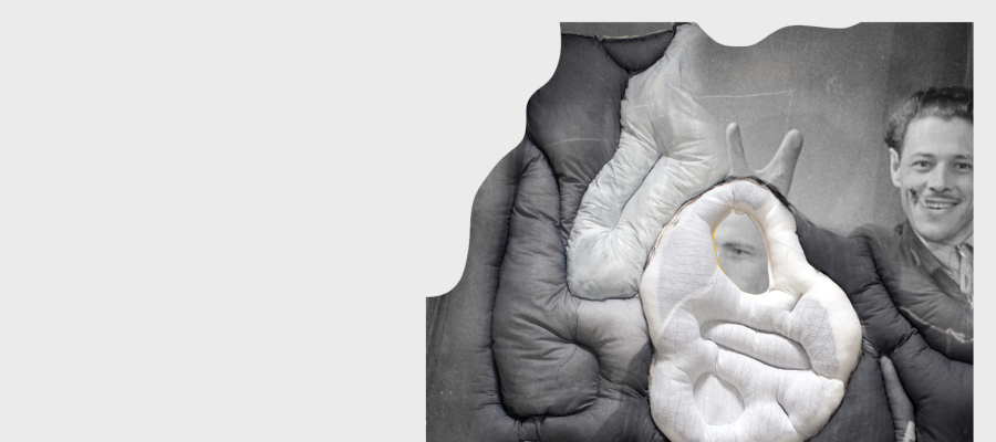 A black-and-white photo of a smiling man in the background is overlaid with soft, padded, abstract fabric shapes, partially obscuring the image.